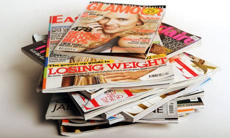 A pile of women-focus magazines are stacked on top of each other.