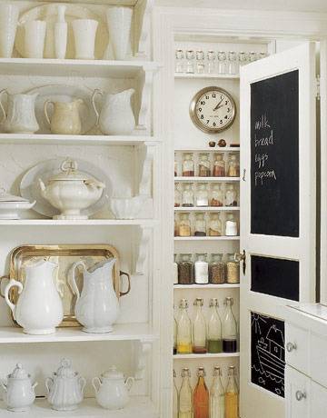 Kitchen and dining items in storage racks.