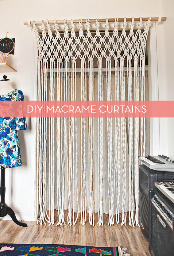 Do it yourself macrame curtains are displayed in a doorway, hung from a brown curtain rod.