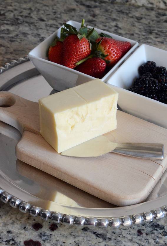 Cheese Cake, and berries on a serving dish.