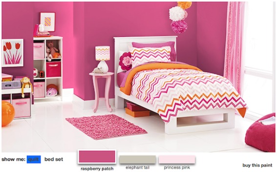 A beautiful and elegant bed is near the pink stool.