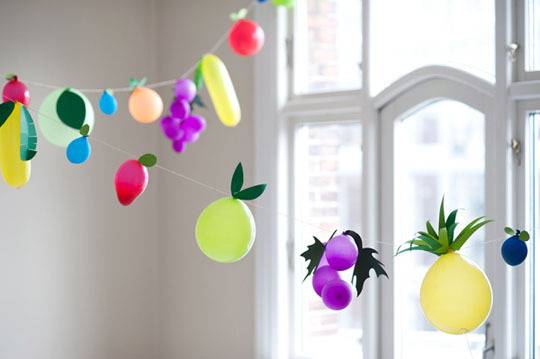 Fruit made from balloons turned into garland 