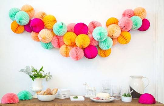 Honeycomb ornaments clustered to create garland