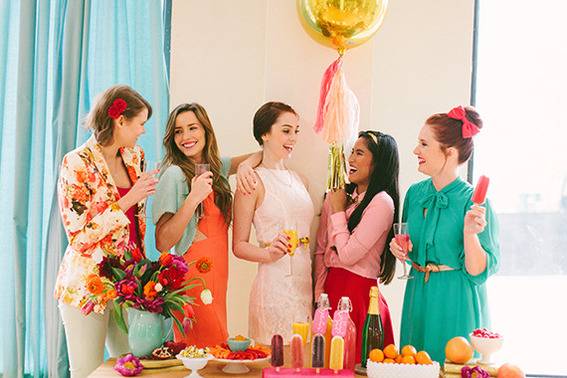 Few girls are standing together and celebrating a party.