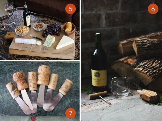 Different elements of a cheese plate, wine, cheese, and cheese knives with cork handles.