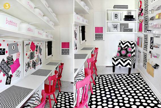 Black, white and pink interior of a craft room with chairs and rugs.