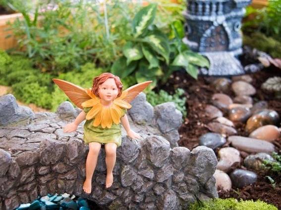 "Fairy adventurous garden with angel.'