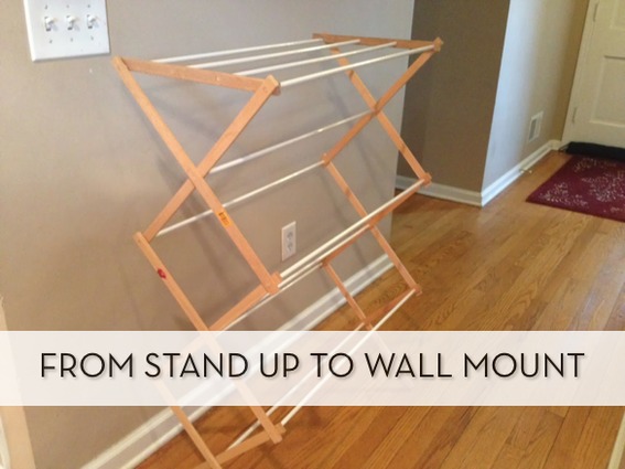 "Living room with standing and wall mounted drying rack."