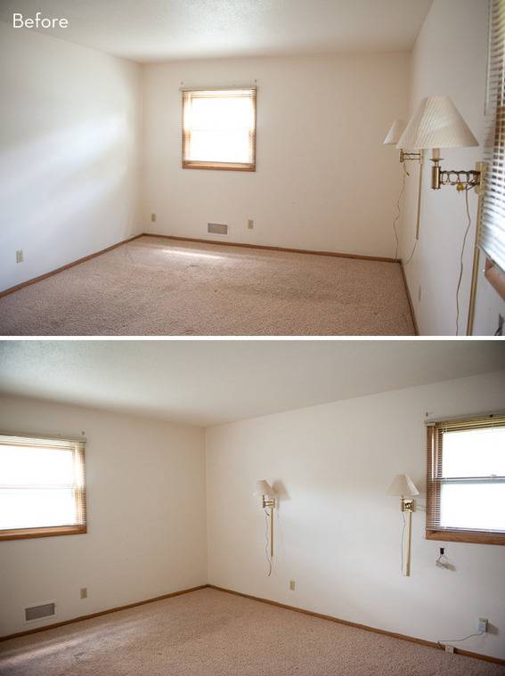 A bare room has several windows in it.