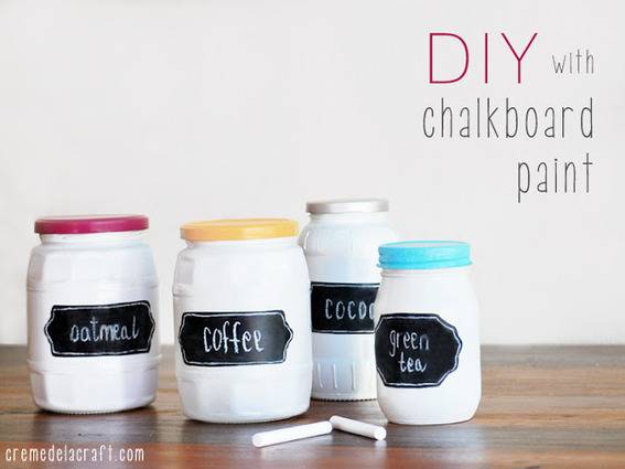 Mason jars painted whife, and labeled with various names for kitchen items.
