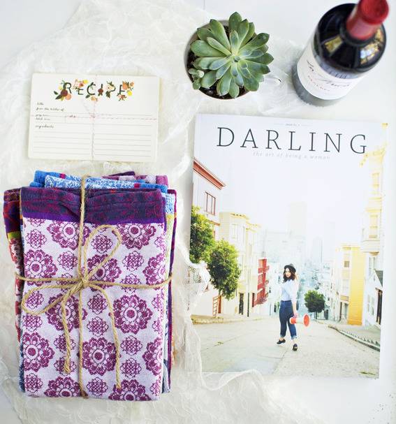 Several cloths are tied together next to a book named “Darling.”