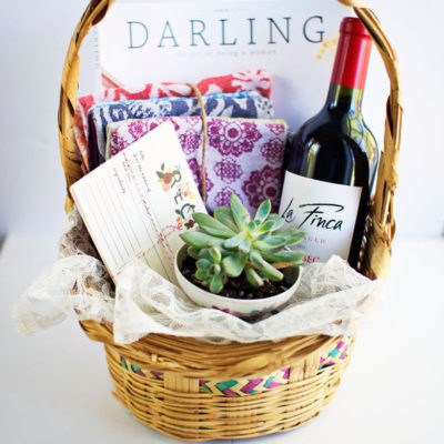 A warming basket with wine and magazines