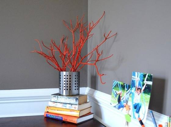 Painted twigs in a vase.