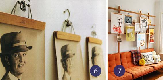 Hang art using vintage clothing hangers.