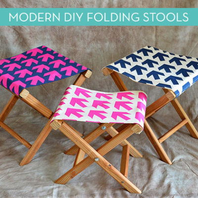 Arrows on pink on white, pink on blue, and blue on white on folding stools.