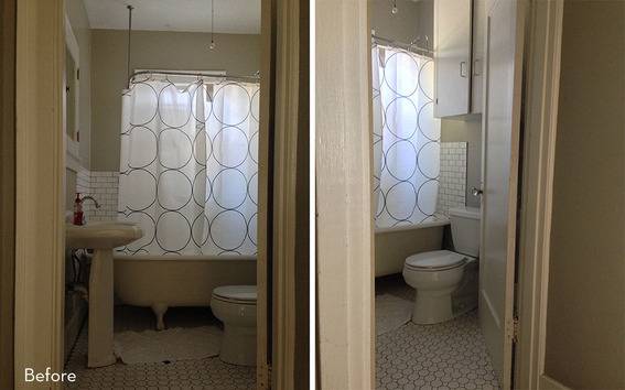 "Dark dramatic bathroom with circle printed curtains."