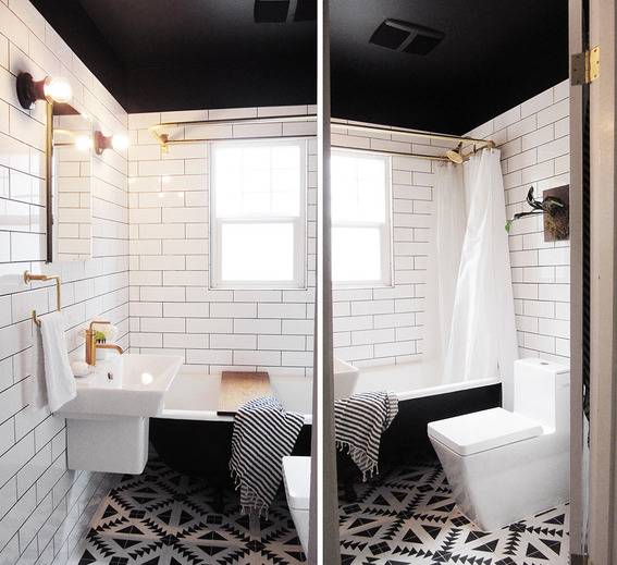 "Dramatic bathroom with black and white tiles."