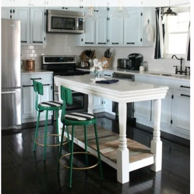 Dinning table with chairs in modular kitchen.