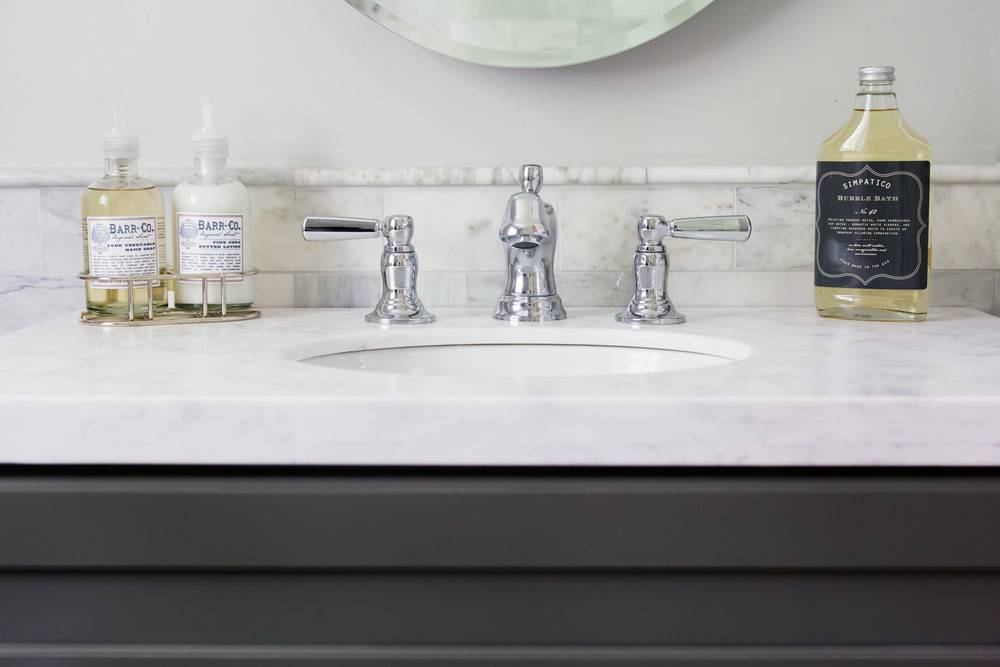 Grey vanity and aspen quartz top from US Marble