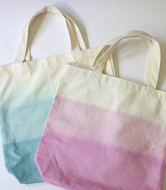 "White cloth bag in blue and pink colours."