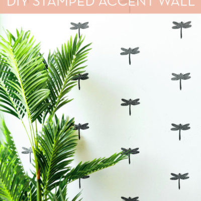 "Stamped statement wall sticker design with plant."