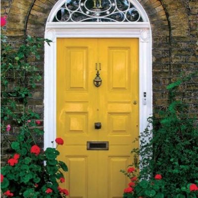An outside door painted in yellow