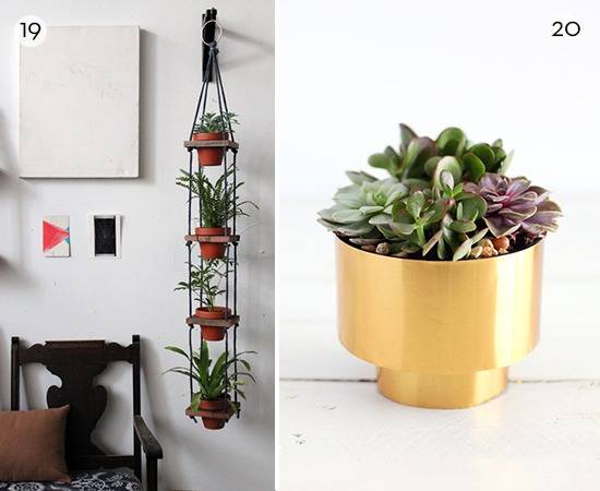 A double screen shows a chair and hanging plants next to a gold potted plant.
