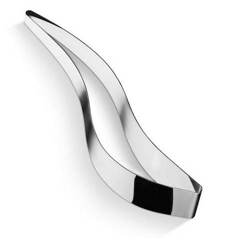 A black and white object is slightly in the shape of a woman's shoe.