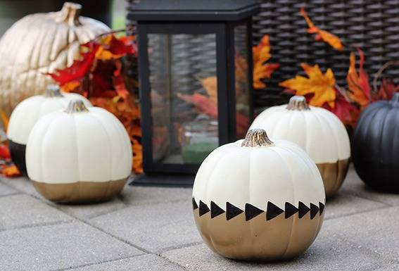 An assortment of pumpkins with artsy designs, and a Fall theme overall.