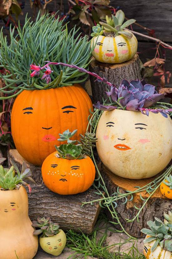 Faces have been made out of a set of pumpkin.