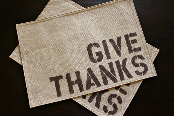 The words Give Thanks are written on napkins.