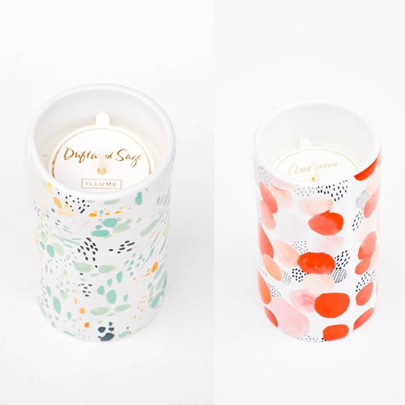 Two designed candles in jars.
