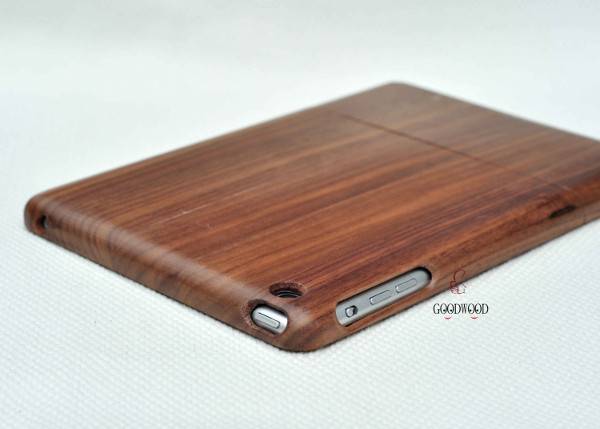 A wood case covering a tablet has cutouts for the buttons.