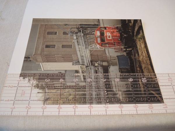 A photo of a construction site sits on a white surface.