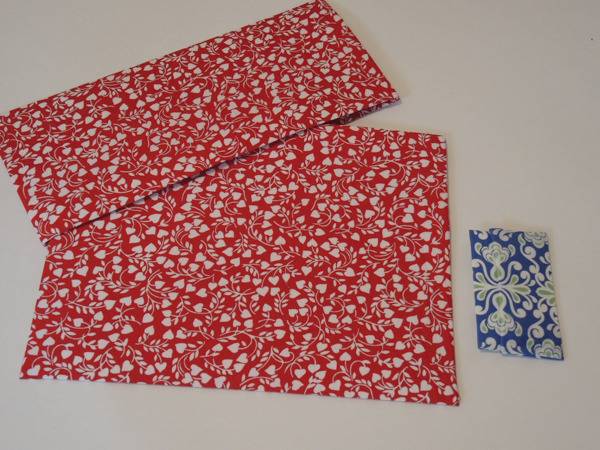 Colorful fabric decorated with hearts and floral design.