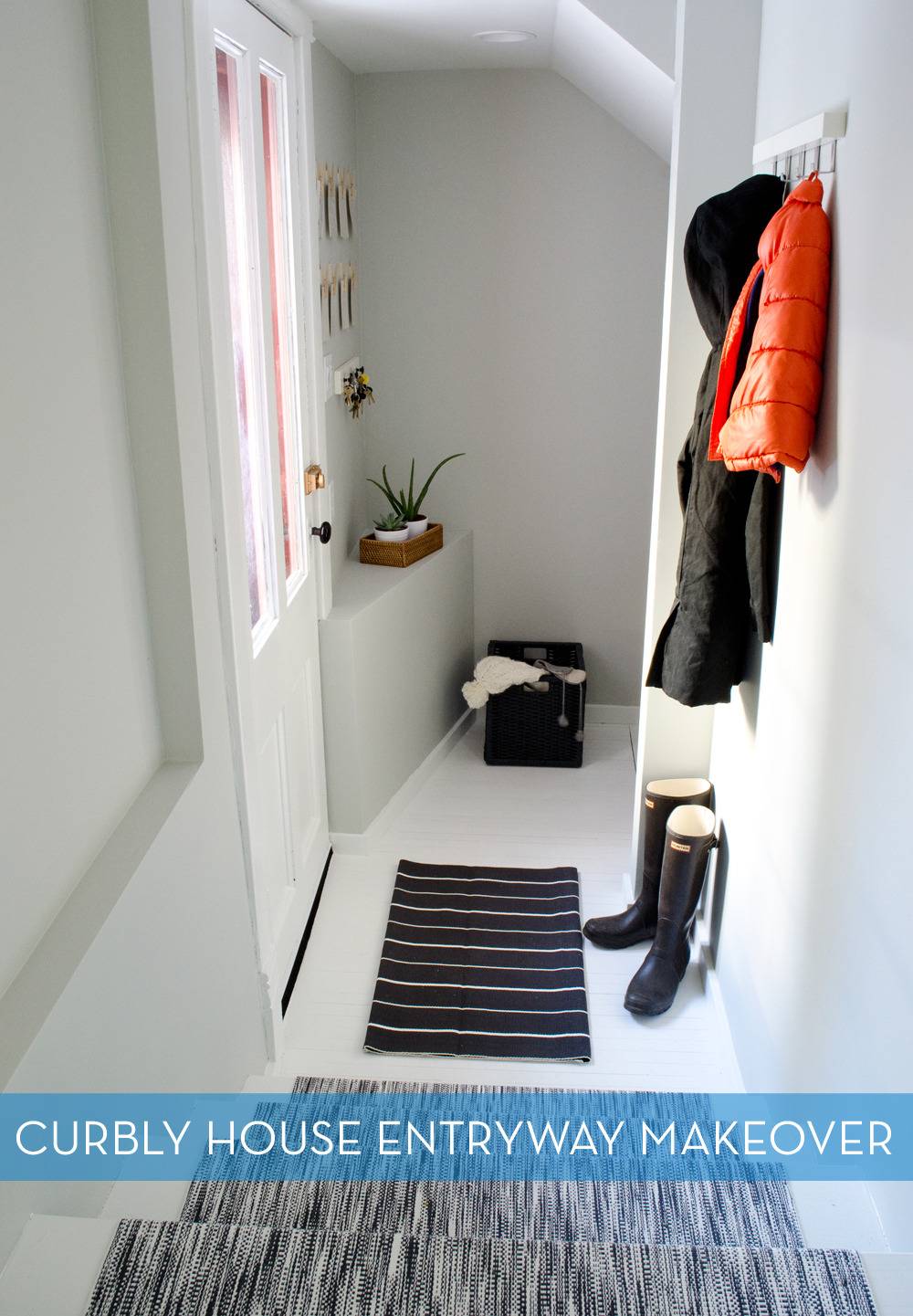 Curbly House entryway makeover project - new floors, stairs and a fresh coat of paint make this dingy hallway a bright welcoming space.