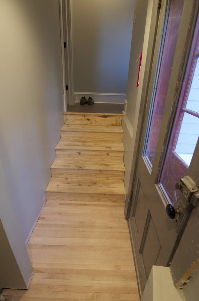 "Entryway with bunch of maple flooring."