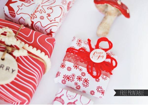 Small wrapped christmas presents, in red and white wrapping paper.