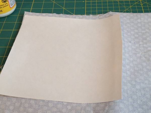 A piece of paper on the backside of the fabric.