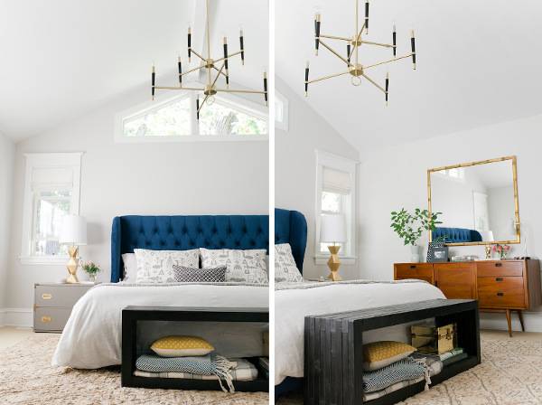 White room with modern style chandelier and a blue bed