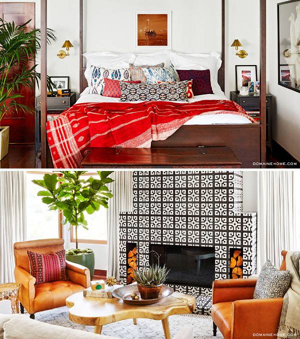 A four poster bed with a red covering strewn at the base and a living room with a burlwood coffee table and orange chairs in front of a black and white tiled fireplace.