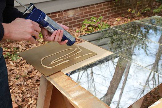 Apply mirror adhesive to mirror