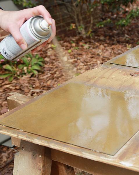 gold spray paint backs of mirror