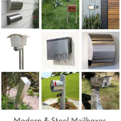 Grouping of steel mailboxes in front of houses or on houses.