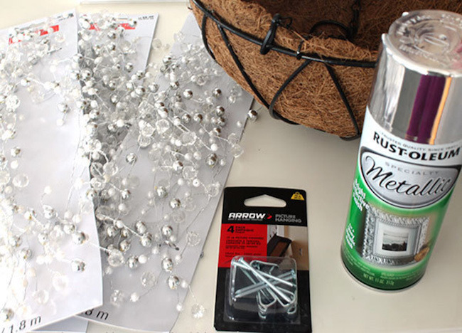 A can of Rustoleum sits next to other crafting materials.