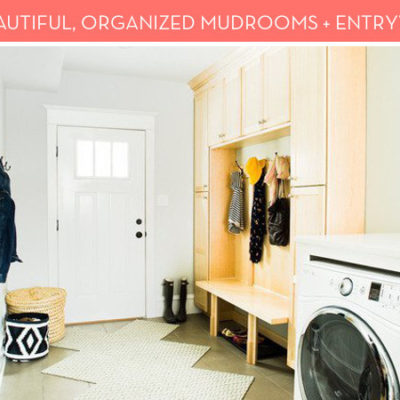 A mudroom with a pale peach set of cupboards above a bench and a washer and dryer.