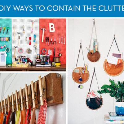 Several colorful ornaments hanging on a white wall.