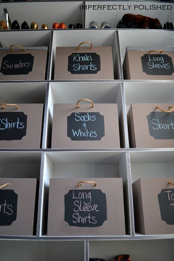 Closet organizer with small boxes with lettering on them sectioned out.
