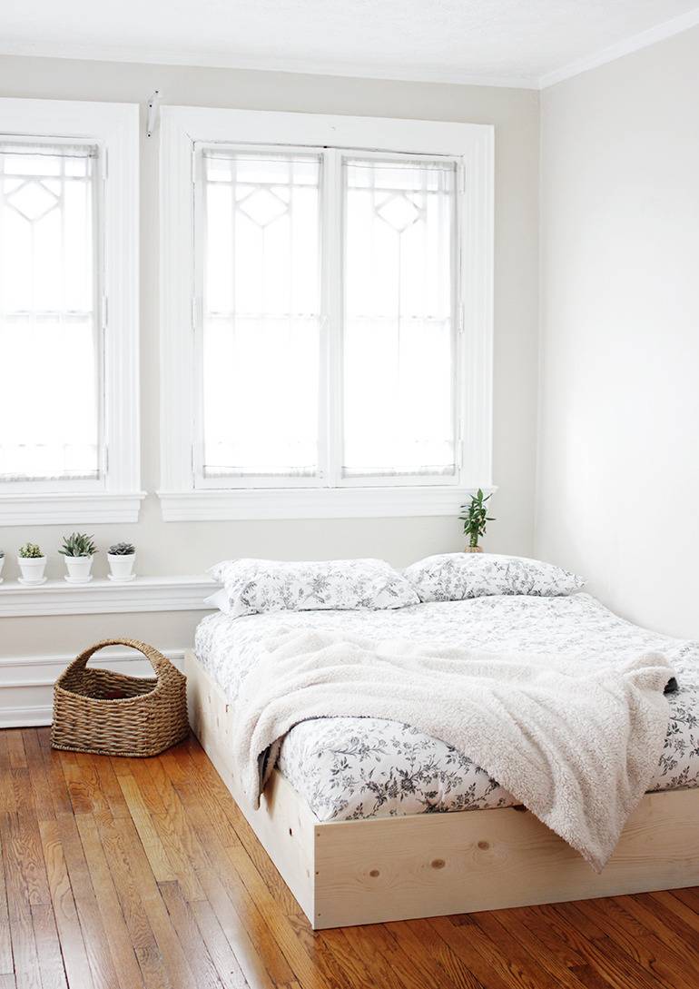 A bright, clean naturally lit bedroom.