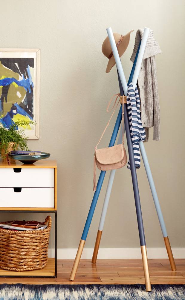 A hanging coat and cap hanger with clutter free side table